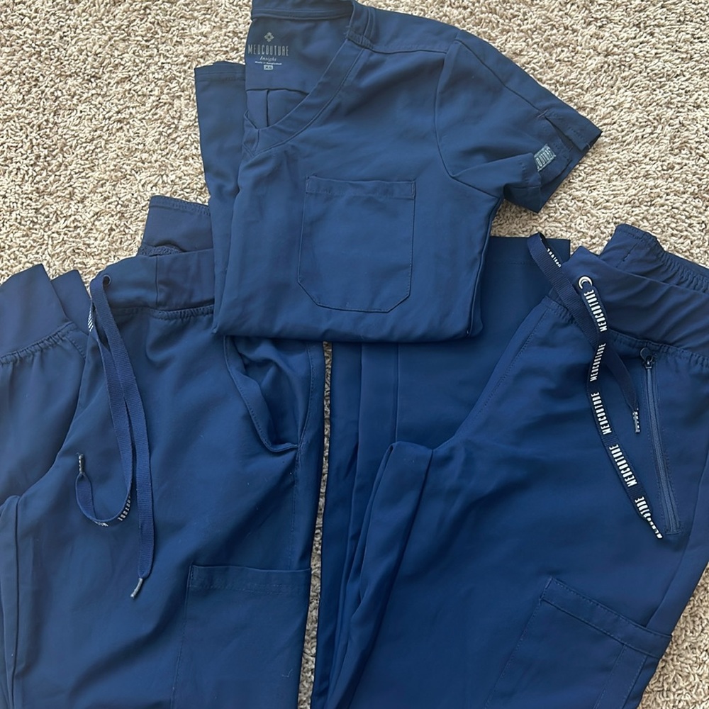 2 scrub pants and 1 scrub top lot